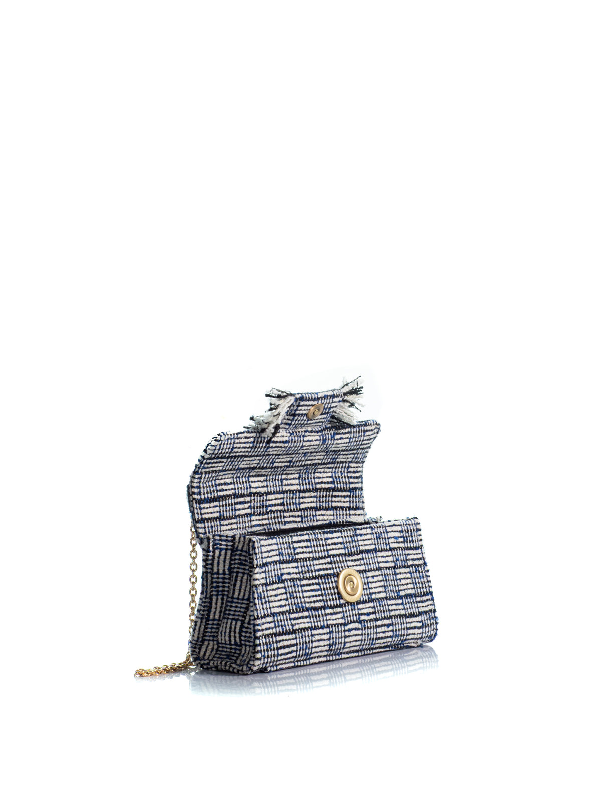 Open view of the KOORELOO Noble Mini in navy and ivory tweed with geometric woven pattern, fringed front detailing, top handle, signature gold-tone closure and chain strap