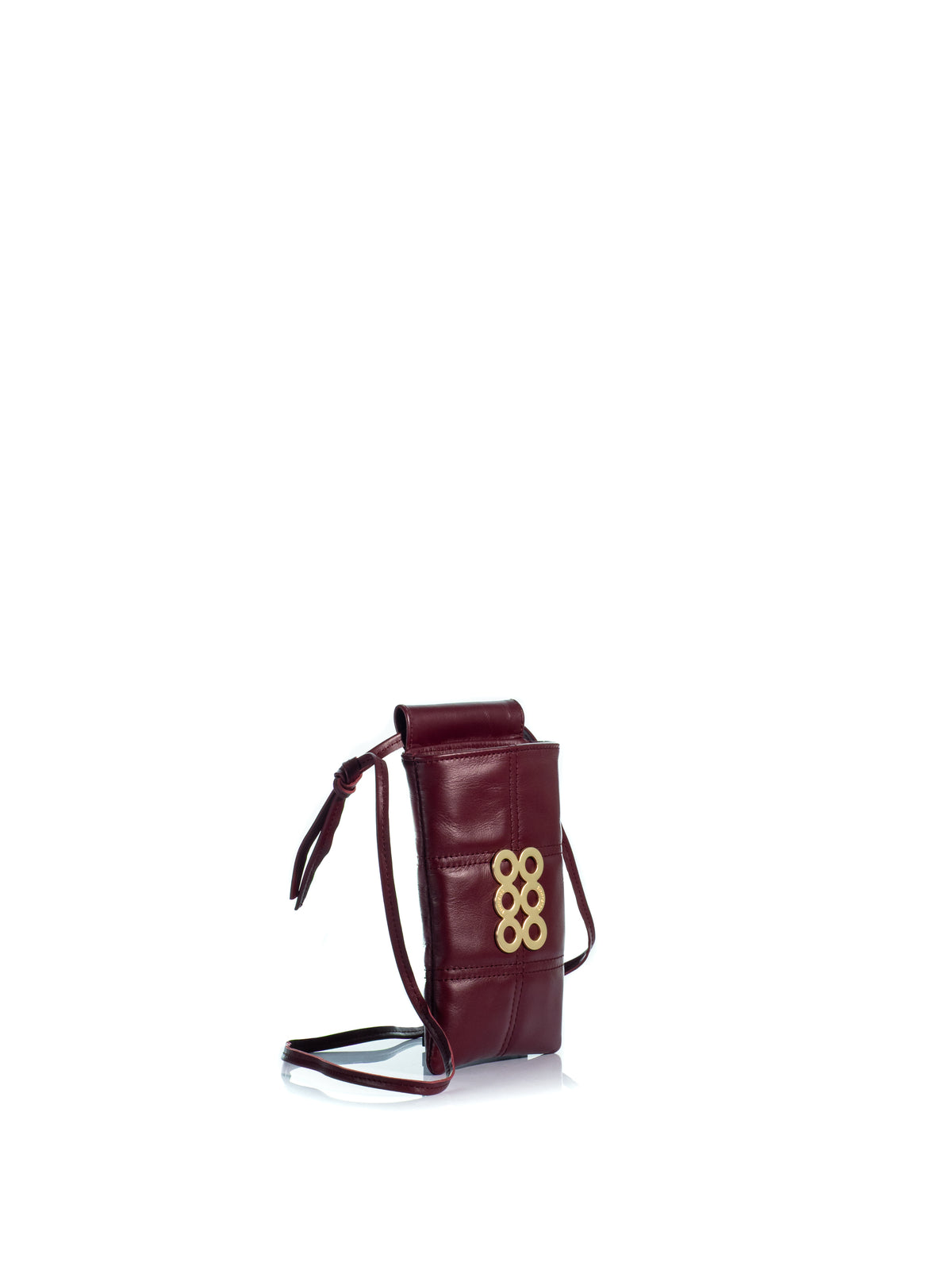 Side view of the KOORELOO Phone Case in burgundy quilted leather with geometric stitching, signature gold-tone six-circle emblem and slender leather crossbody strap