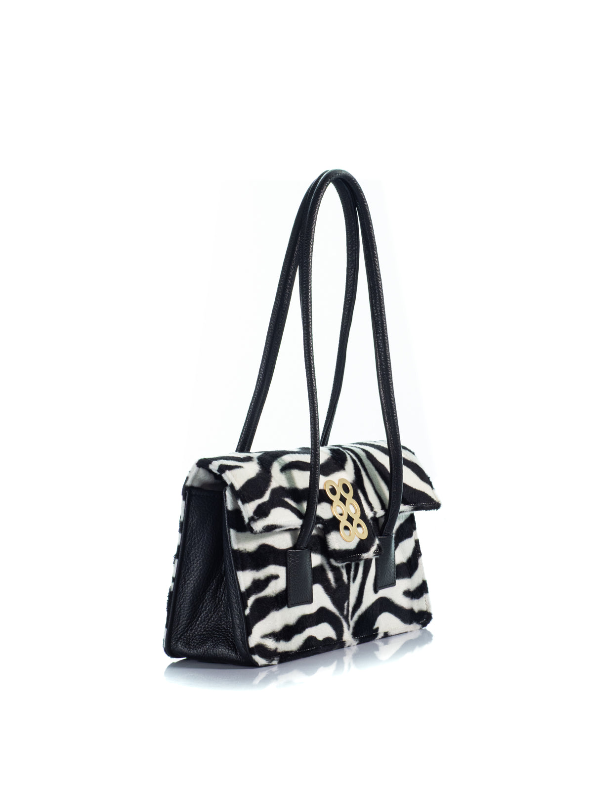 Side view of the KOORELOO Tribeca Zebra Pony Hair shoulder bag with black leather handles and signature gold-tone emblem