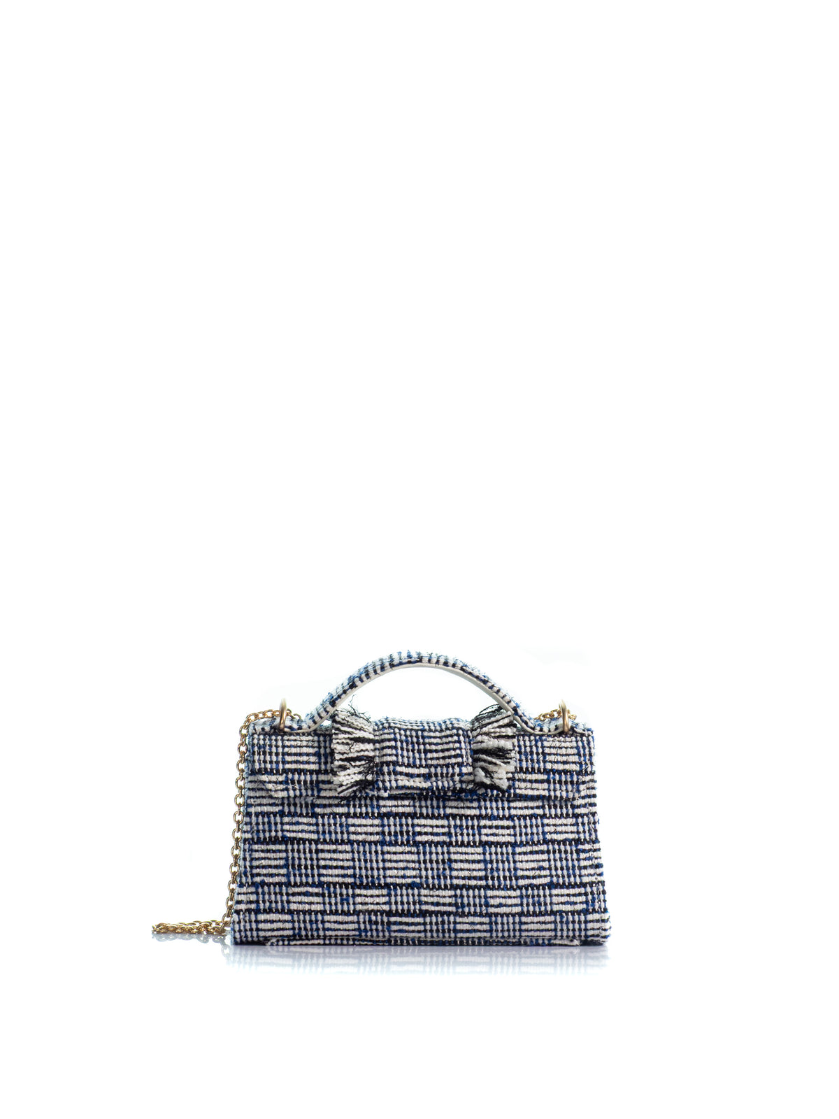 Back view of the KOORELOO Noble Mini in navy and ivory tweed with geometric woven pattern, fringed front detailing, top handle, signature gold-tone closure and chain strap