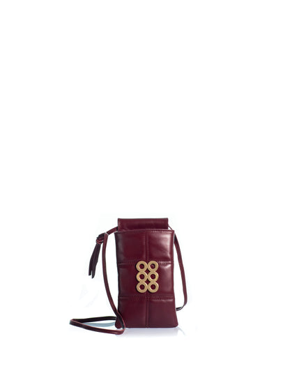 KOORELOO The Phone Case in burgundy quilted leather with geometric stitching, signature gold-tone six-circle emblem and slender leather crossbody strap