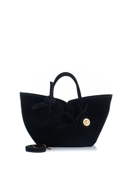 KOORELOO The Swan Belle in black suede with sculptural flared silhouette, knotted top handles, gold-tone circular detail and detachable shoulder strap