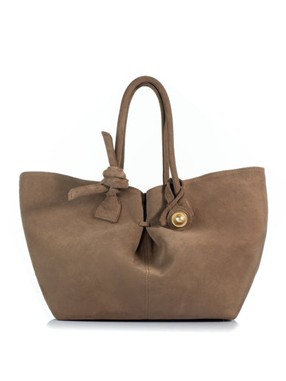 KOORELOO The Swan Belle Maxi in brown suede with spacious flared silhouette, double knotted shoulder handles and signature gold-tone circular detail