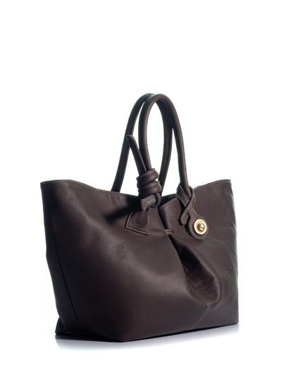 Side view of the KOORELOO The Swan Belle Maxi dark brown leather bag with sculptural knotted handles