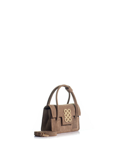 Side View of The Tribeca Petite brown suede top handle bag with gold-tone KOORELOO emblem and detachable crossbody strap
