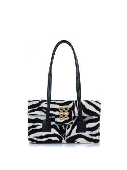 KOORELOO The Tribeca Zebra Pony Hair shoulder bag with black leather handles and signature gold-tone emblem